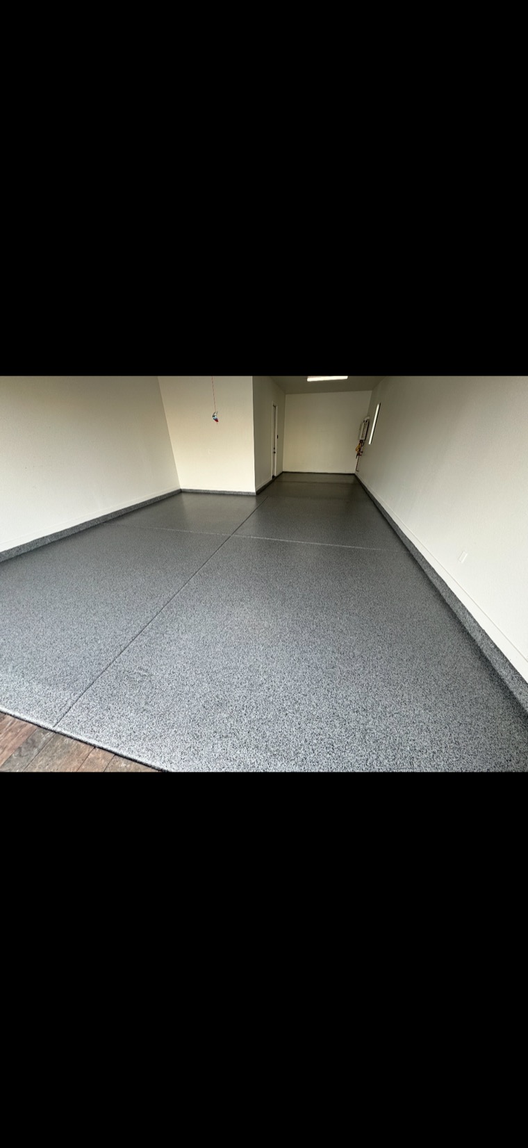 Grey flake chip garage floor finish by Sandoval Coating Co