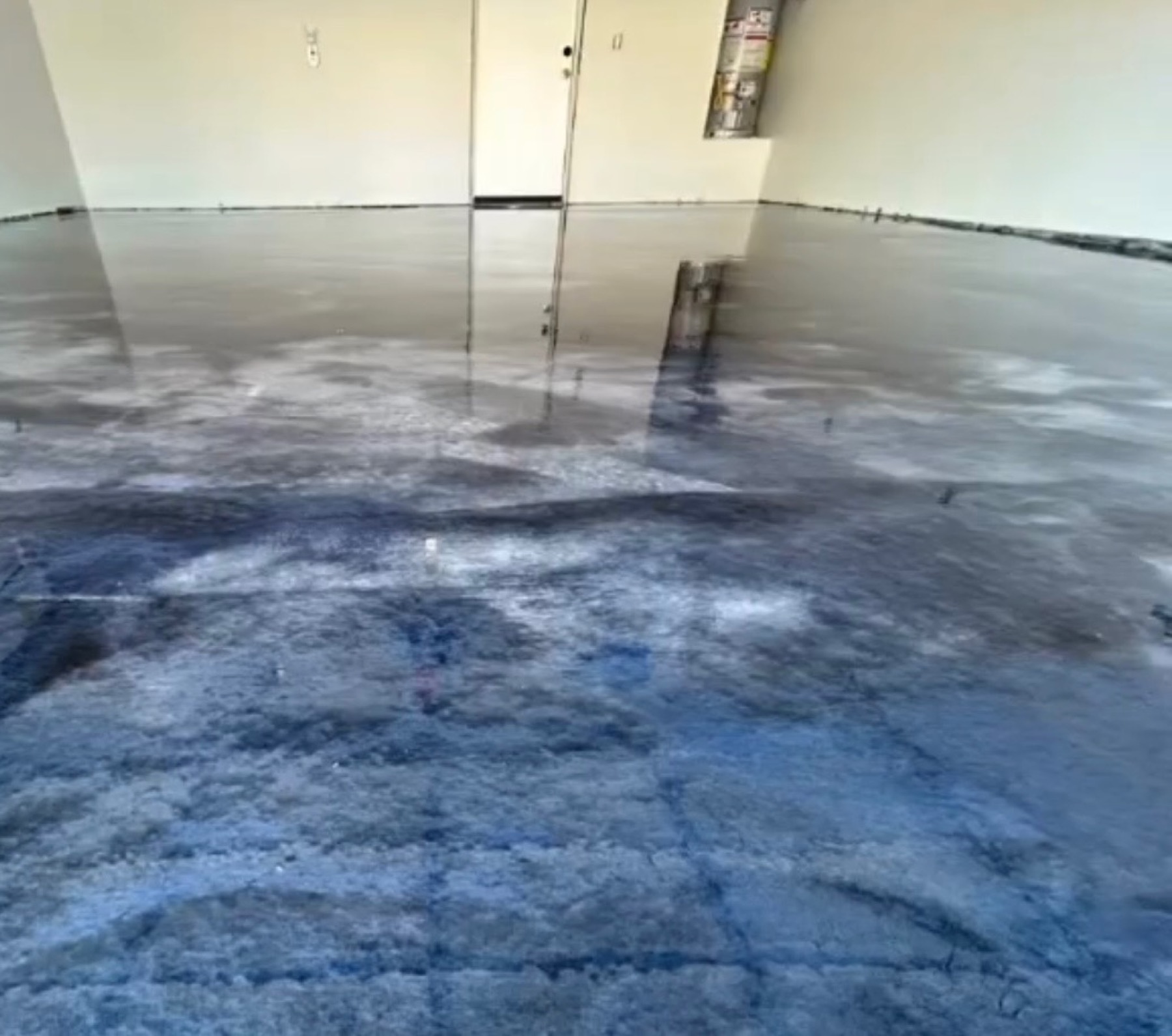 Blue metallic epoxy floor by Sandoval Coating Co